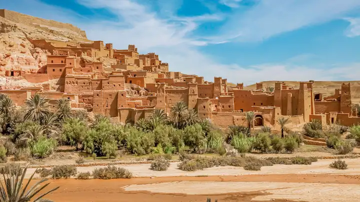 Kasbah ait benhaddou and the green palm oasis in morocco