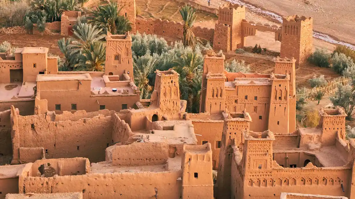 aerial view of kasbah ait benhaddou with palm trees