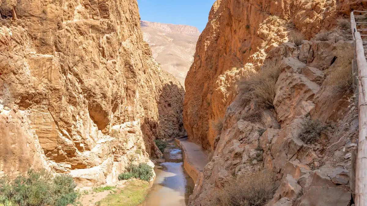 river and pedestrian passage in todra gorge in morocco