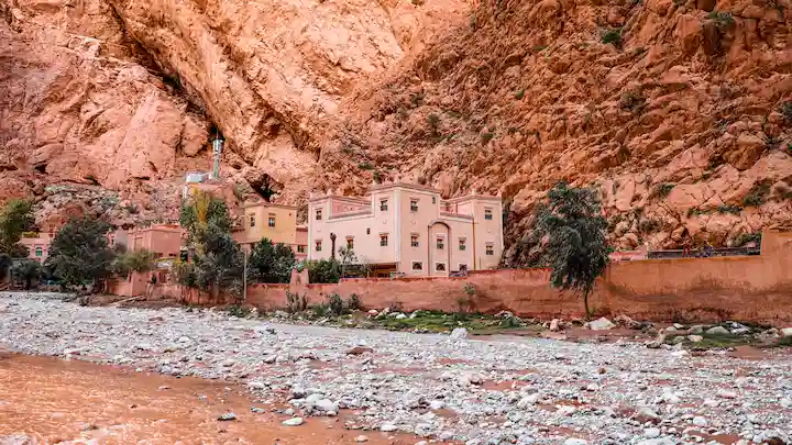 buildings and river in todra gorge in Morocco