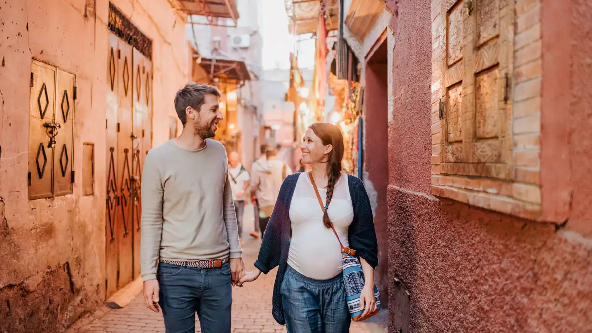 couple travel to marrakech in the medina