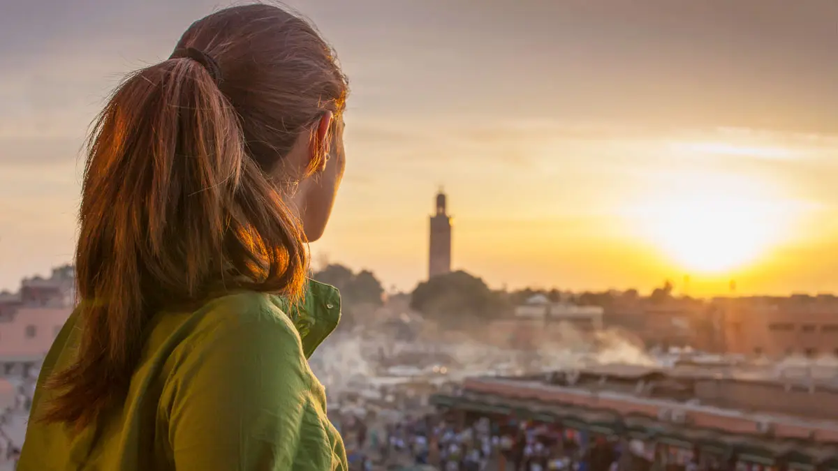 women looking at jamaa el fna in marrakech