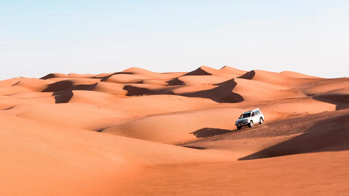 4wd vehicle in the sahara desert of morocco