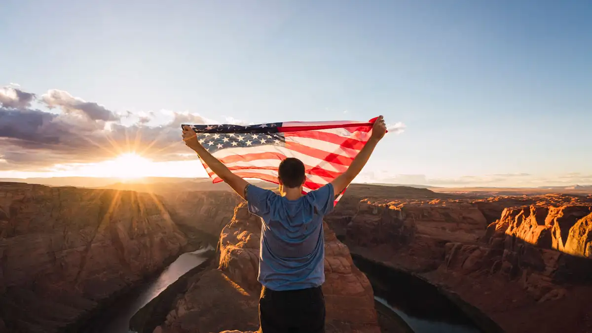 man holding usa flag in morocco: Travel to Morocco from the USA