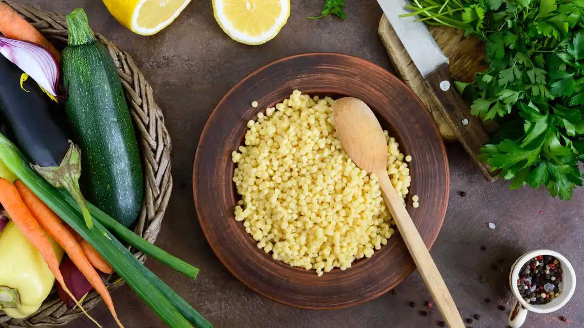 couscous with vegetables and spices on the table